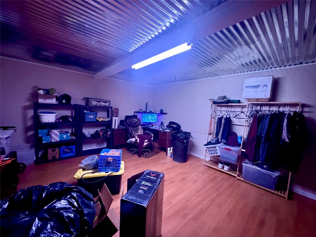 303 Charles Street Cleveland, TX 77327 - Photo 24 of 43 a view of a room with gym equipment