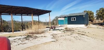2 Terwilliger Road Anza, CA 92539 - Photo 4 of 5 a view of a house with a snow on the road