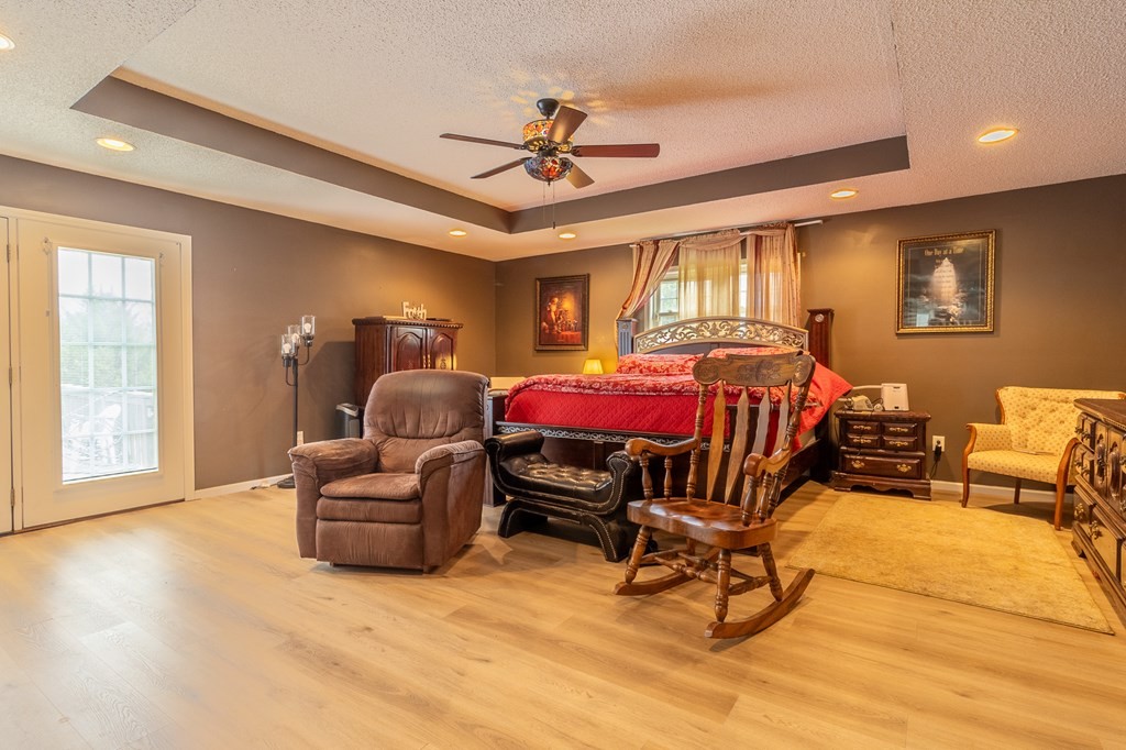 374 Allen Road West Chatsworth, GA 30705 - Photo 11 of 28 a bedroom with furniture and a window