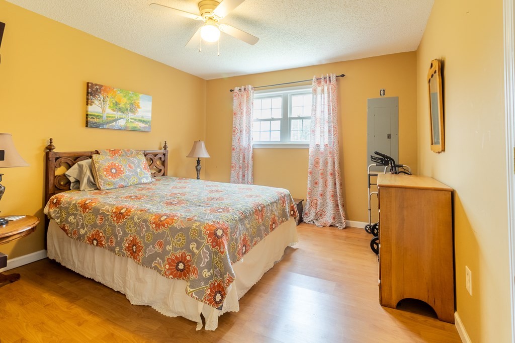 374 Allen Road West Chatsworth, GA 30705 - Photo 16 of 28 a bedroom with a bed dresser and a window