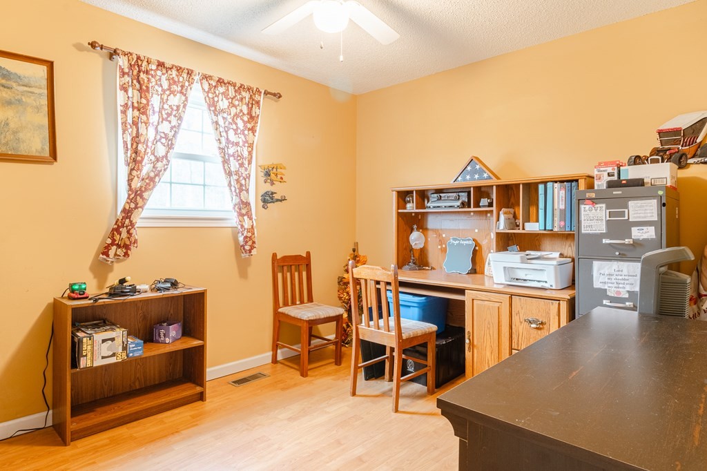 374 Allen Road West Chatsworth, GA 30705 - Photo 17 of 28 a view of a living room and workspace
