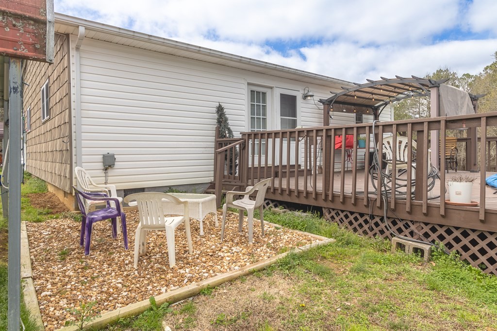 374 Allen Road West Chatsworth, GA 30705 - Photo 20 of 28 a view of a backyard with a wooden fence