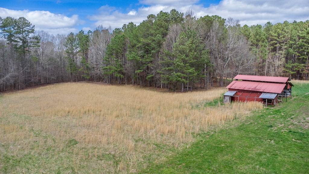 374 Allen Road West Chatsworth, GA 30705 - Photo 24 of 28 a backyard of a house with table and chairs