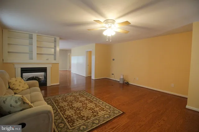a bathroom with a sink toilet and mirror