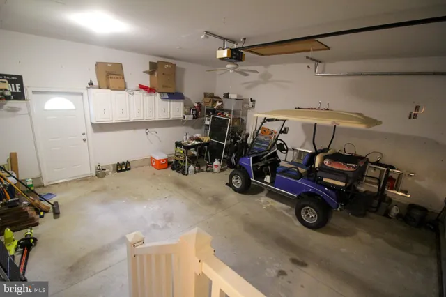 a large kitchen with stainless steel appliances lots of counter top space and cabinets