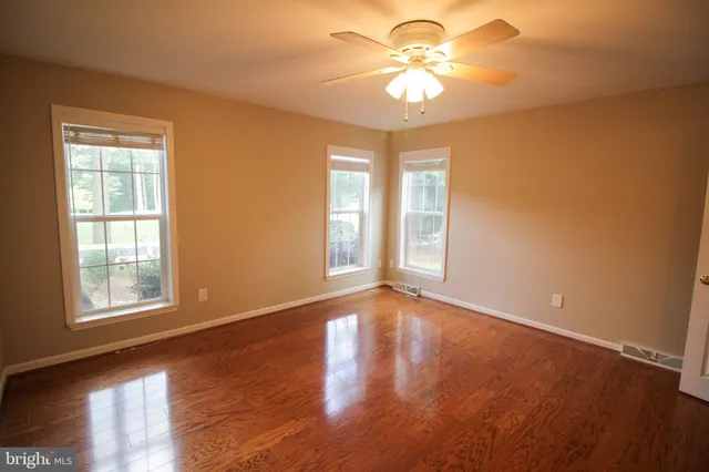 a bathroom with a tub and sink