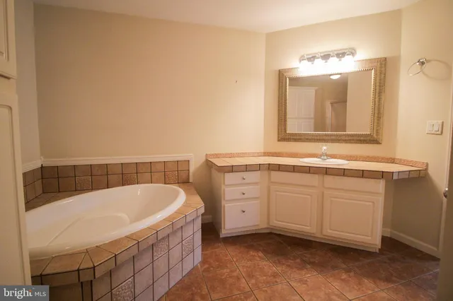 a view of a garden with houses