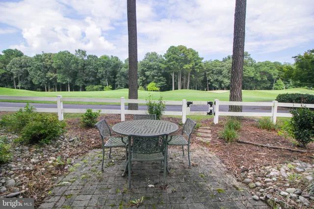 a view of a house with a garden