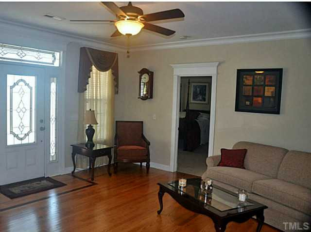 17 North Sunset Ridge Drive Willow Spring, NC 27592 - Photo 6 of 18 a living room with furniture and a window