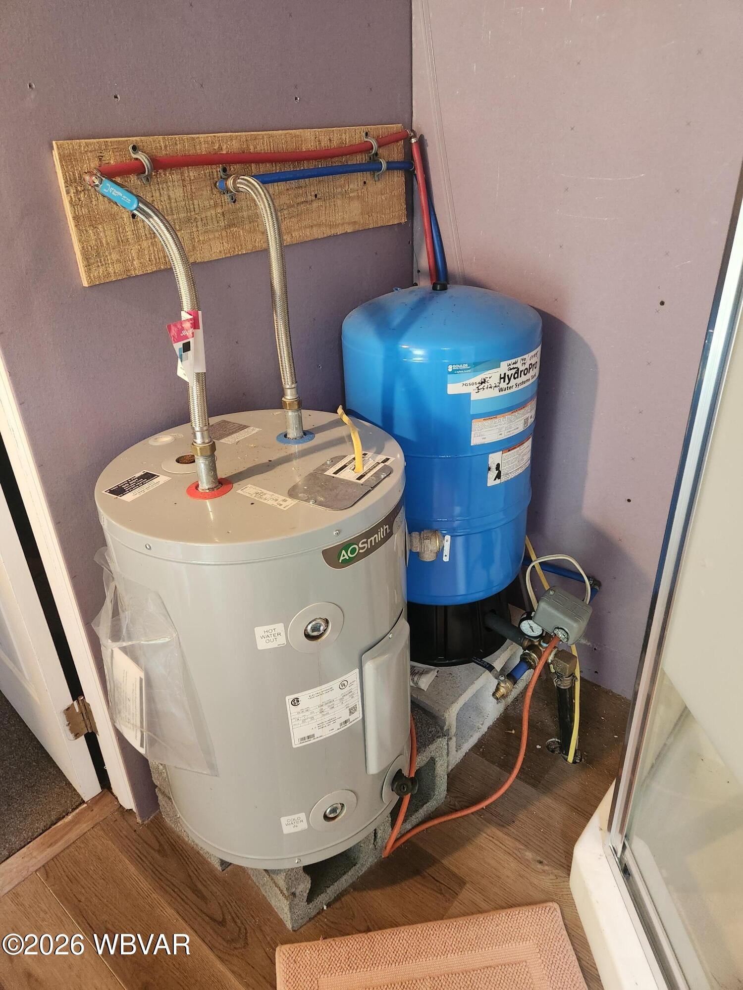 980 State Rte 4007 Forksville, PA 18616 - Photo 21 of 31 Pressure tank and HW tank in bathroom