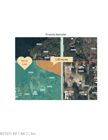 an aerial view of a houses with outdoor space