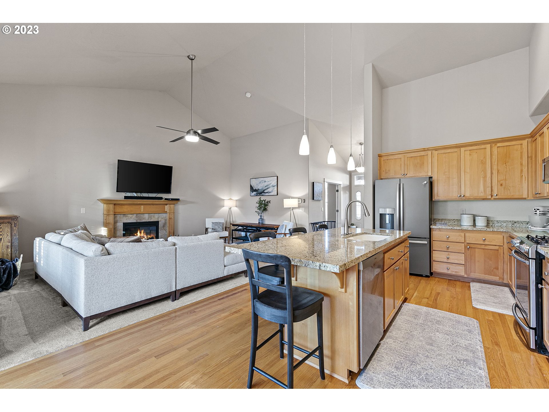 1200 South 41st Place Springfield, OR 97478 - Photo 11 of 34 a living room with furniture and a flat screen tv