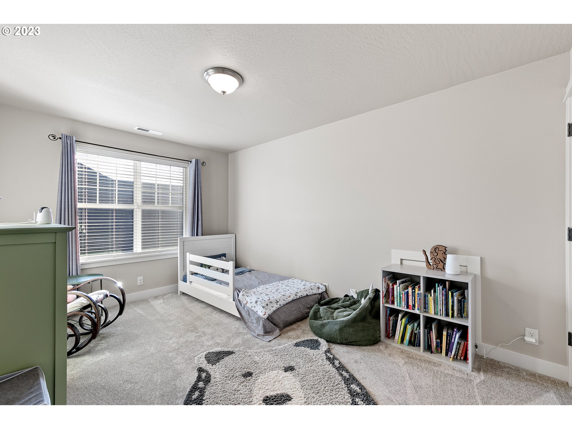 1200 South 41st Place Springfield, OR 97478 - Photo 28 of 34 a bedroom with furniture and a window