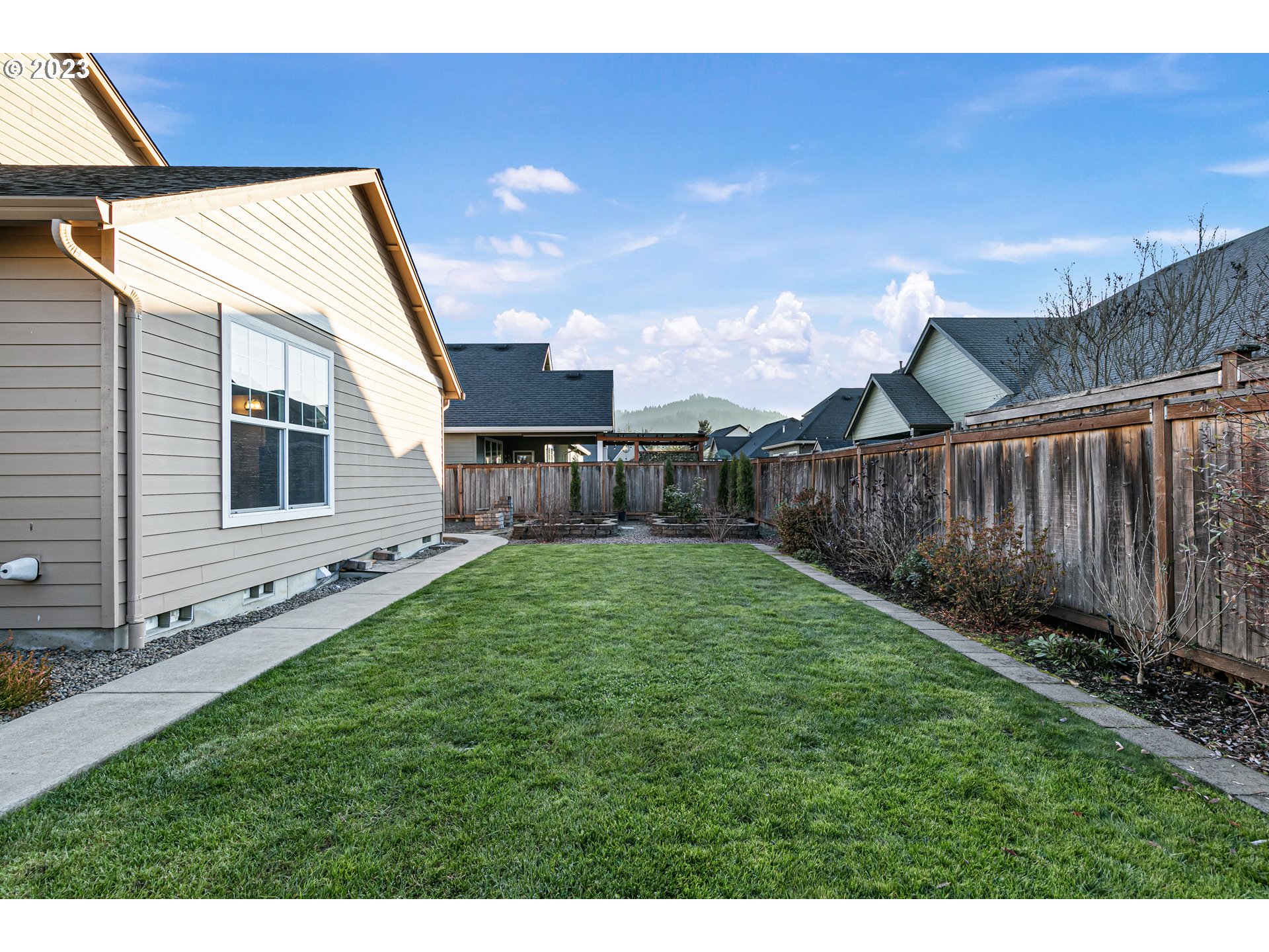 1200 South 41st Place Springfield, OR 97478 - Photo 31 of 34 a view of a backyard with a garden
