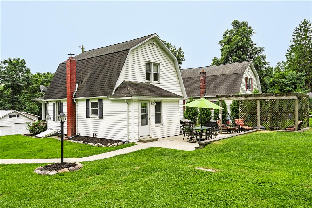 280 Oak Road Bangor, PA 18013 - Photo 41 of 52 A spacious concrete patio and overhead pergola define the rear lawn of this classic home.