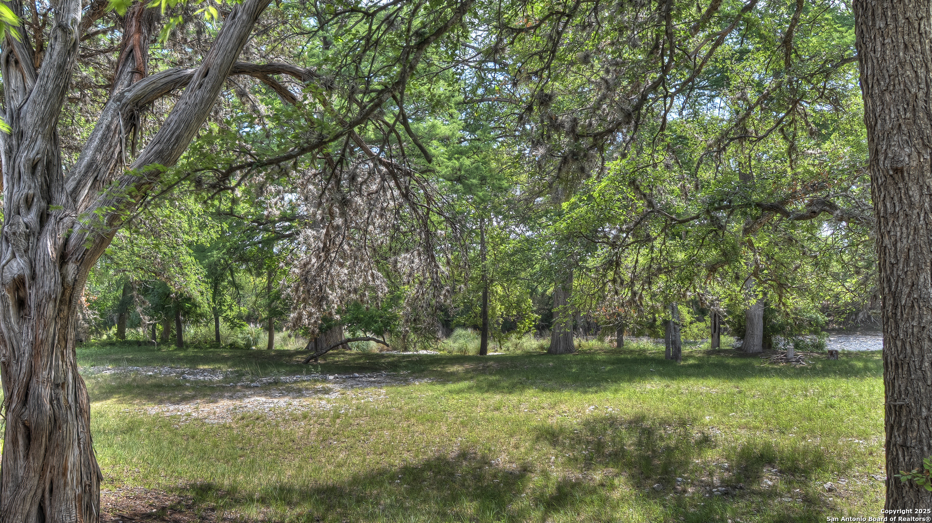 154 Weston Road Leakey, TX 78873 - Photo 5 of 39 a view of outdoor space with deck area and trees