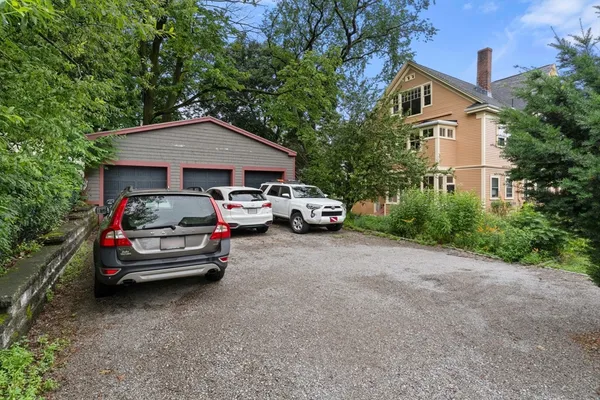 a car parked in front of a house