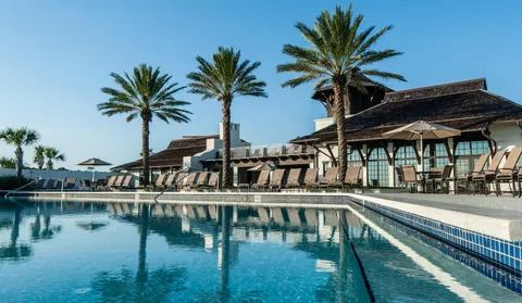a view of a swimming pool with a patio