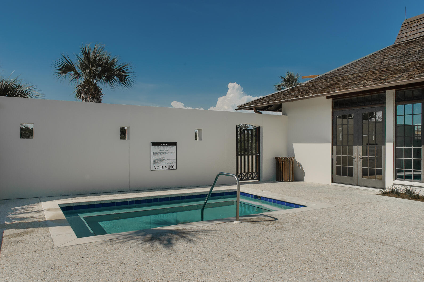 20 Cypress Walk Santa Rosa Beach, FL 32459 - Photo 16 of 47 a house with a bench in front of it