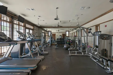 a view of a room with gym equipment