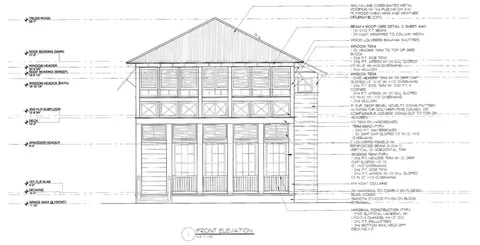 a black and white photo of a black white building