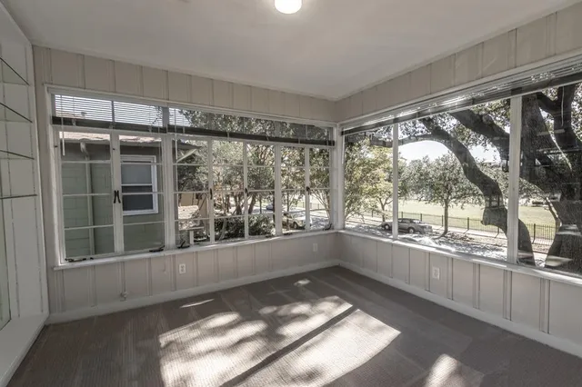 a view of a large window with an outdoor space
