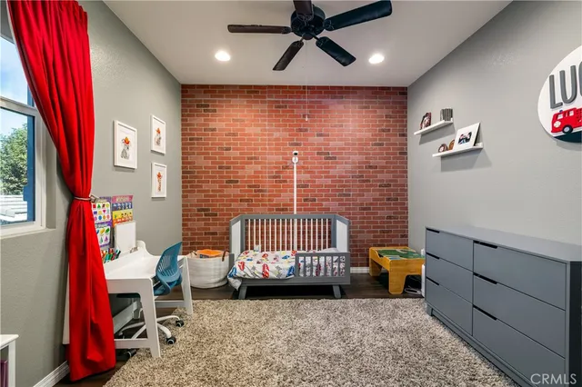 a view of a room with furniture and toys