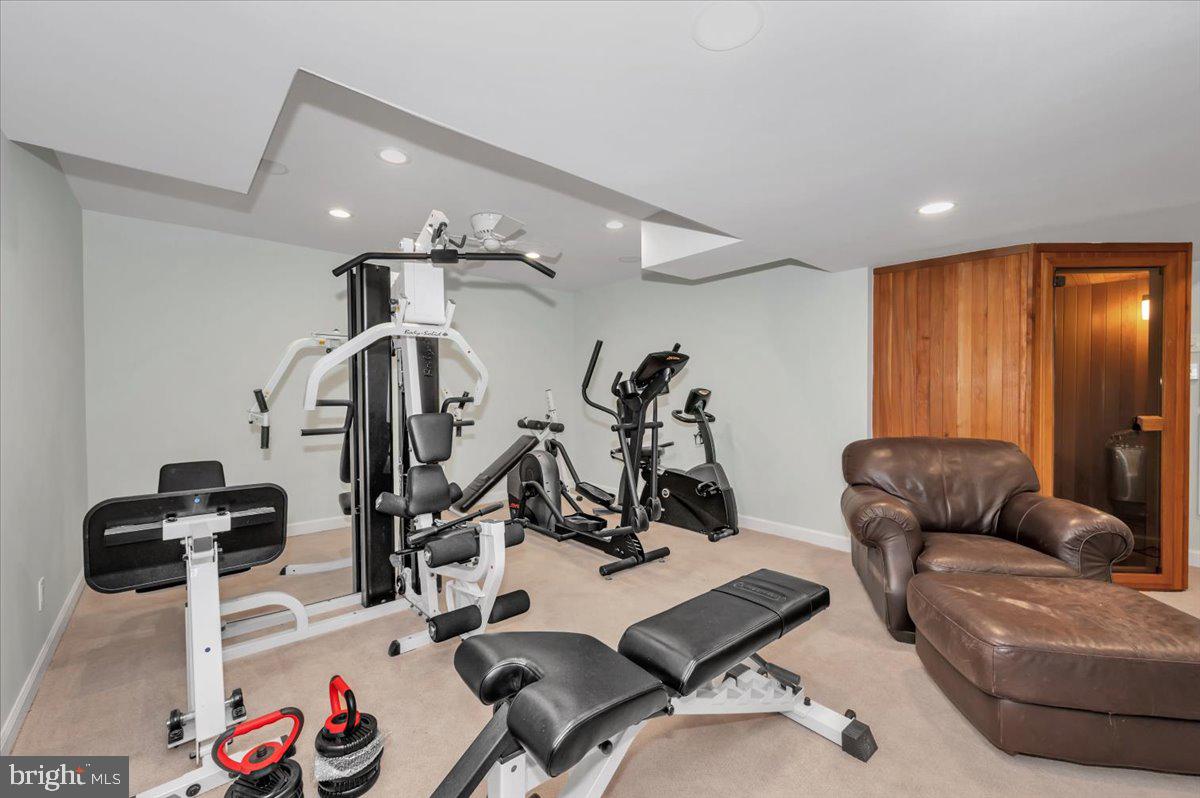 10101 Lloyd Road Potomac, MD 20854 - Photo 35 of 65 Lower level gym/ game room