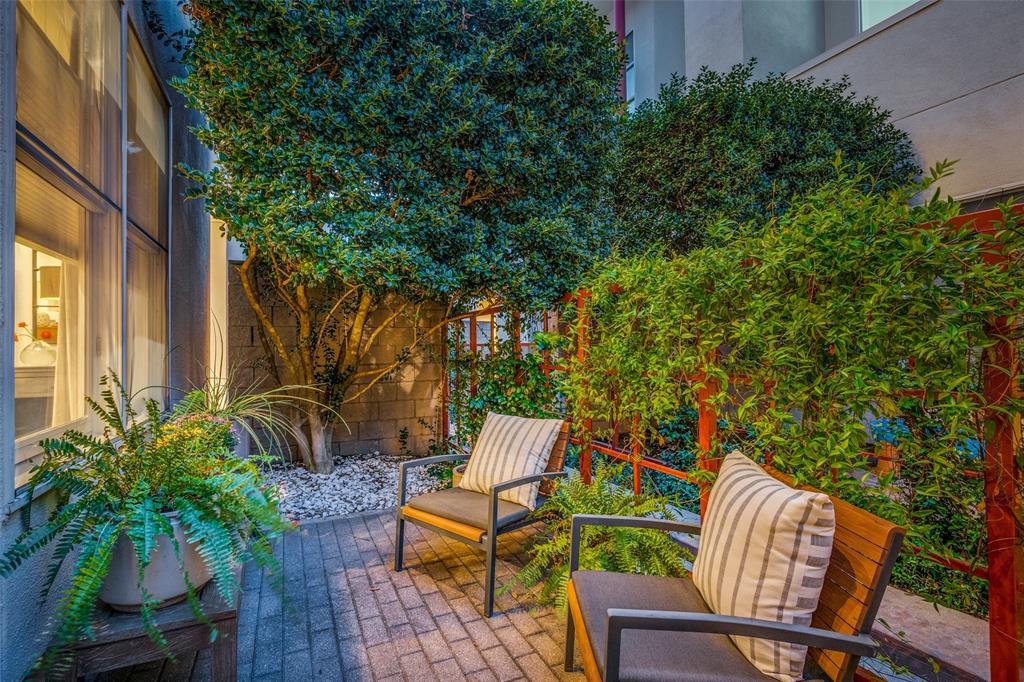 4014 Travis Street, Unit C Dallas, TX 75204 - Photo 20 of 23 a view of chair and table in the patio