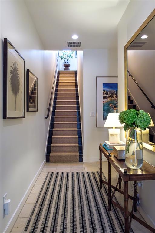 4014 Travis Street, Unit C Dallas, TX 75204 - Photo 2 of 23 a view of a livingroom with furniture and stairs