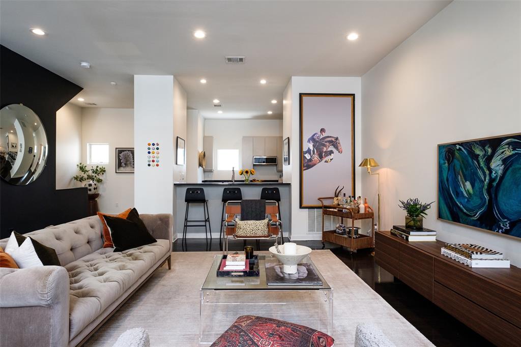 4014 Travis Street, Unit C Dallas, TX 75204 - Photo 5 of 23 a living room with furniture and wooden floor