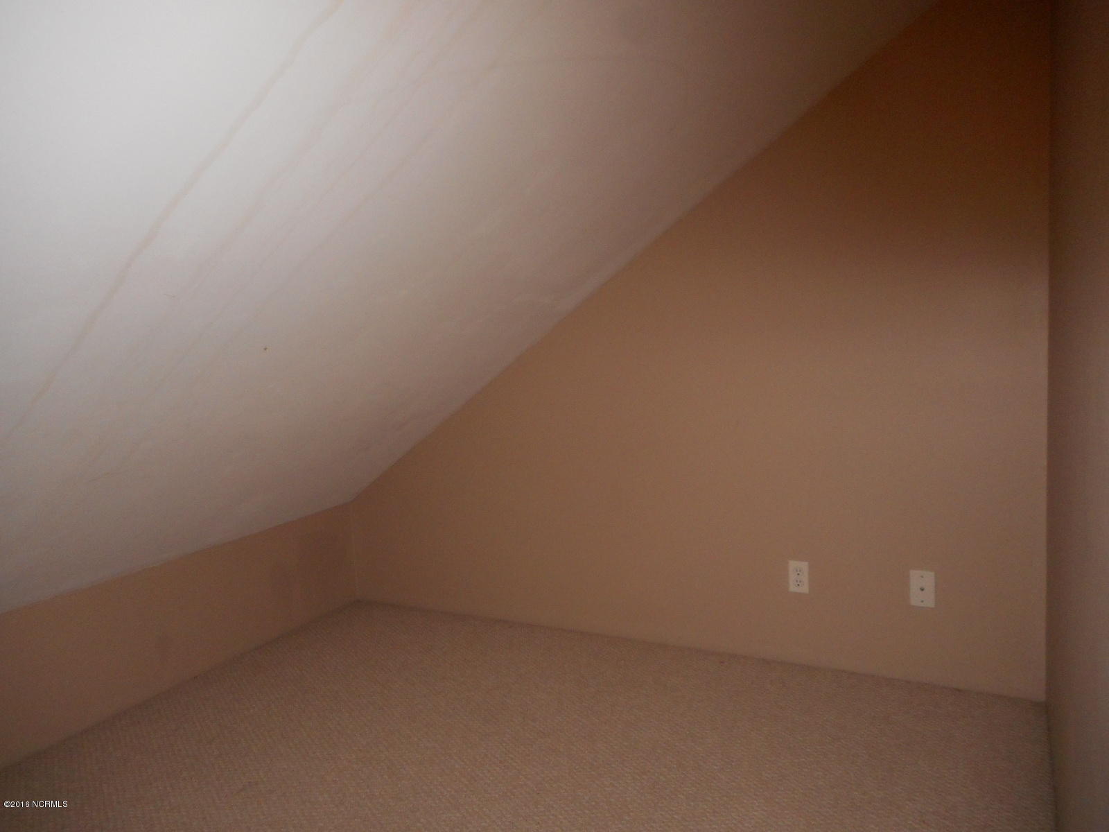 1255 Nine Foot Road Newport, NC 28570 - Photo 63 of 70 1247 Bedroom 3 Storage (2)