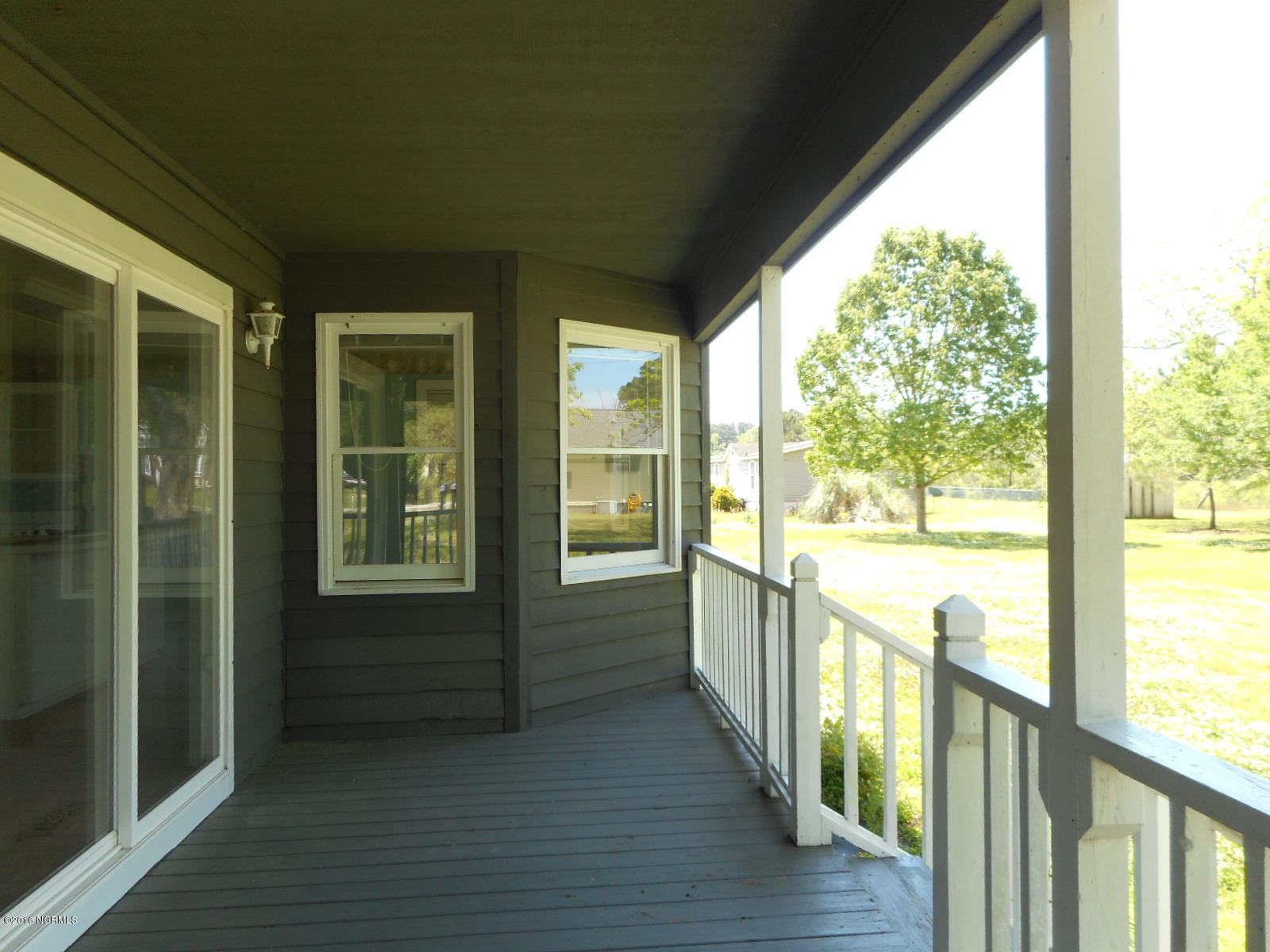 1255 Nine Foot Road Newport, NC 28570 - Photo 65 of 70 Side Porch 1247