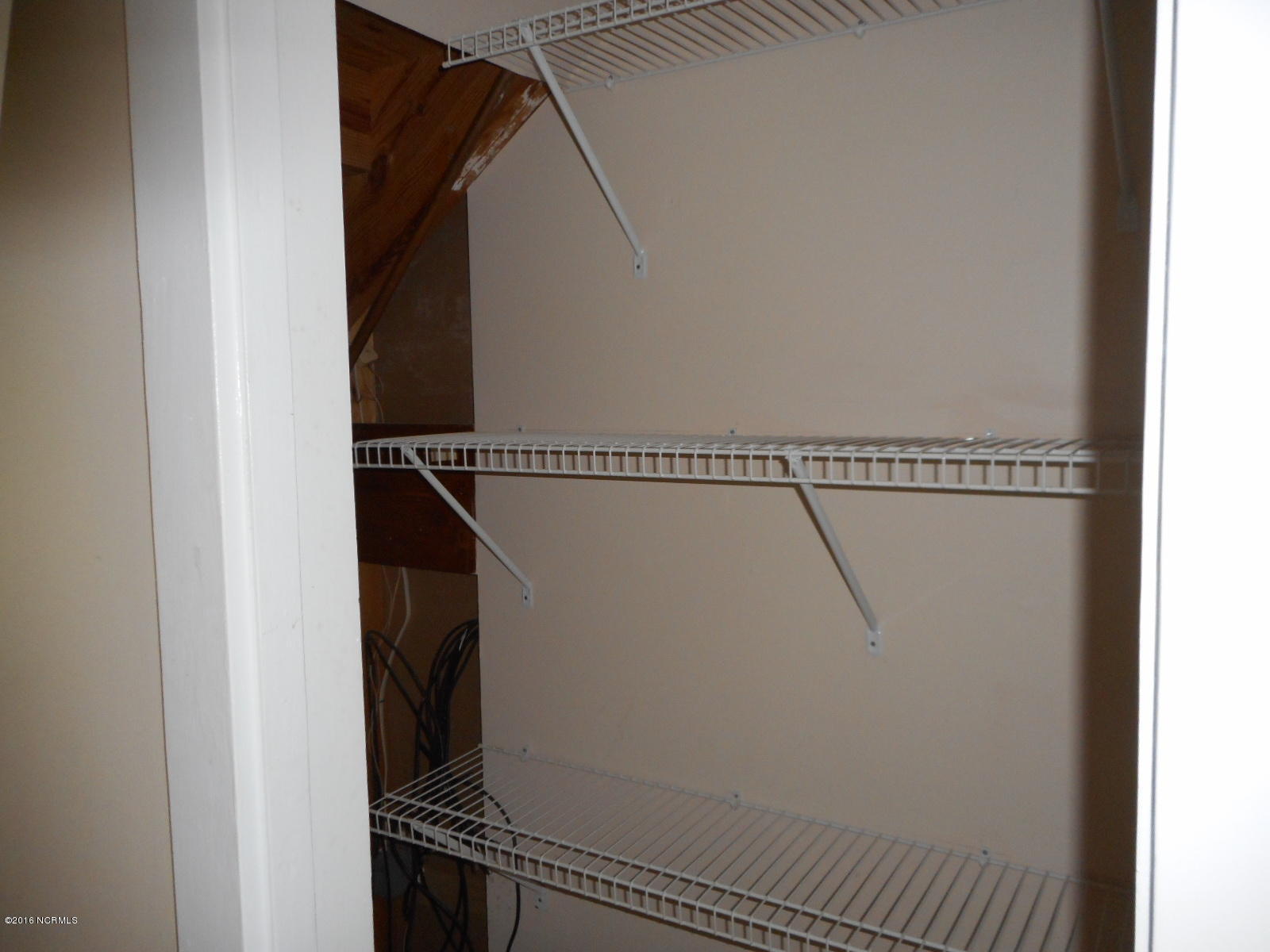 1255 Nine Foot Road Newport, NC 28570 - Photo 70 of 70 1247 Storage Under Stairs