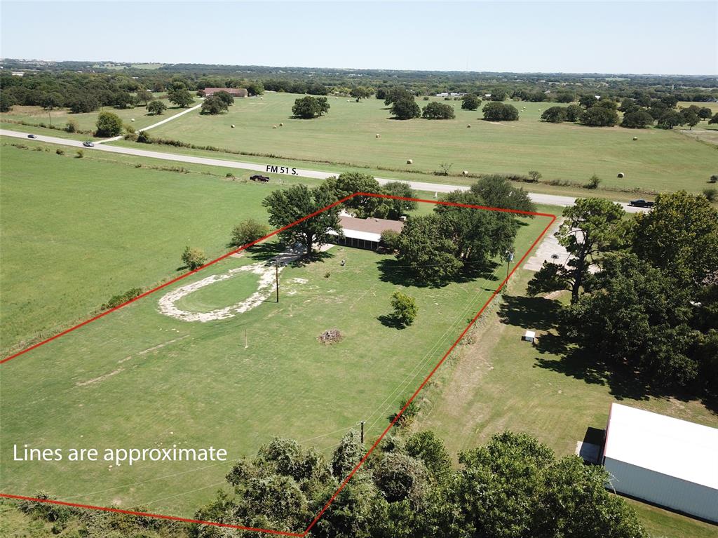 4170 Farm To Market 51 Decatur, TX 76234 - Photo 2 of 36 a view of a lake with a yard