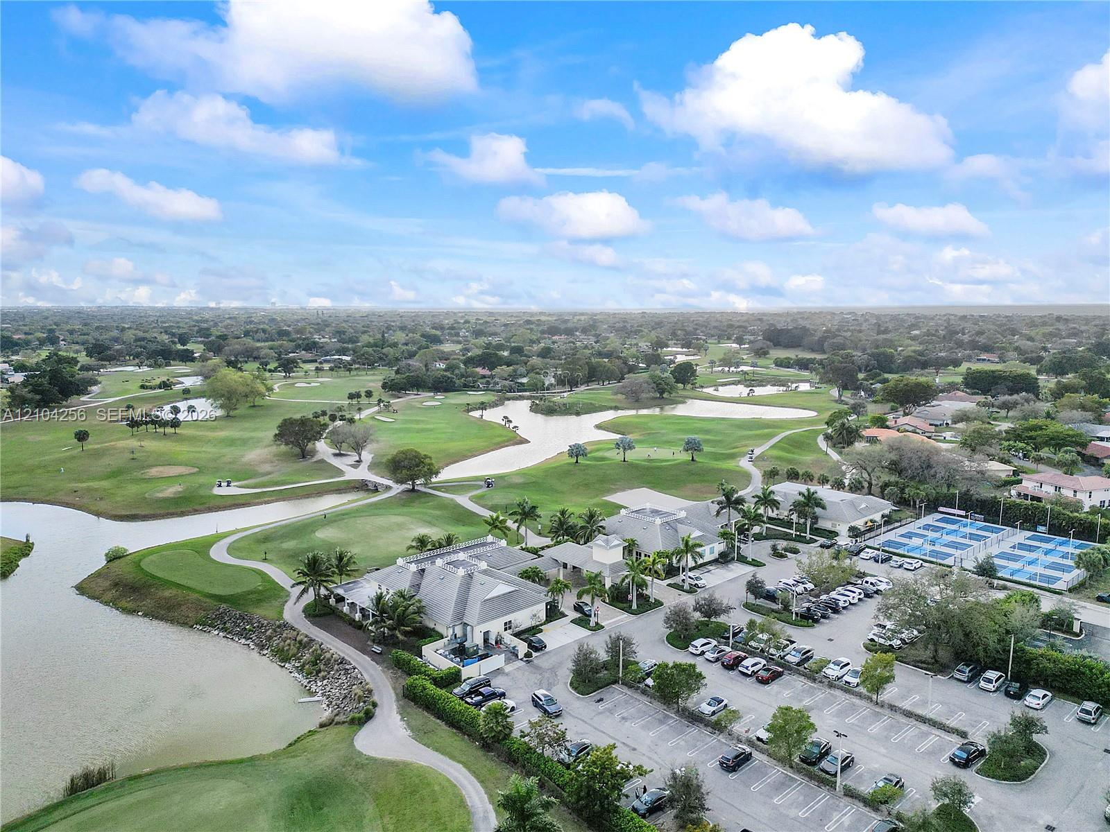 10777 West Sample Road, Unit 907 Coral Springs, FL 33065 - Photo 23 of 45 Coral Springs CC South of Sample Rd from the Towers