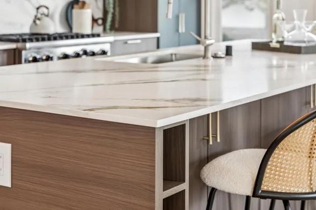 a bedroom with a bed and a chair