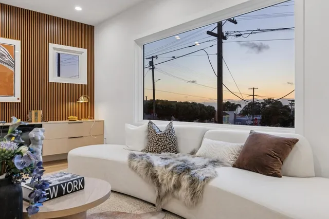 a kitchen with granite countertop a sink and a stove