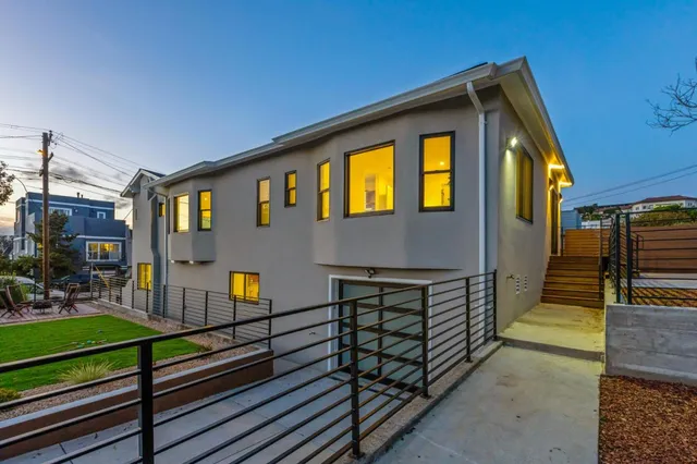 a view of a back yard of the house