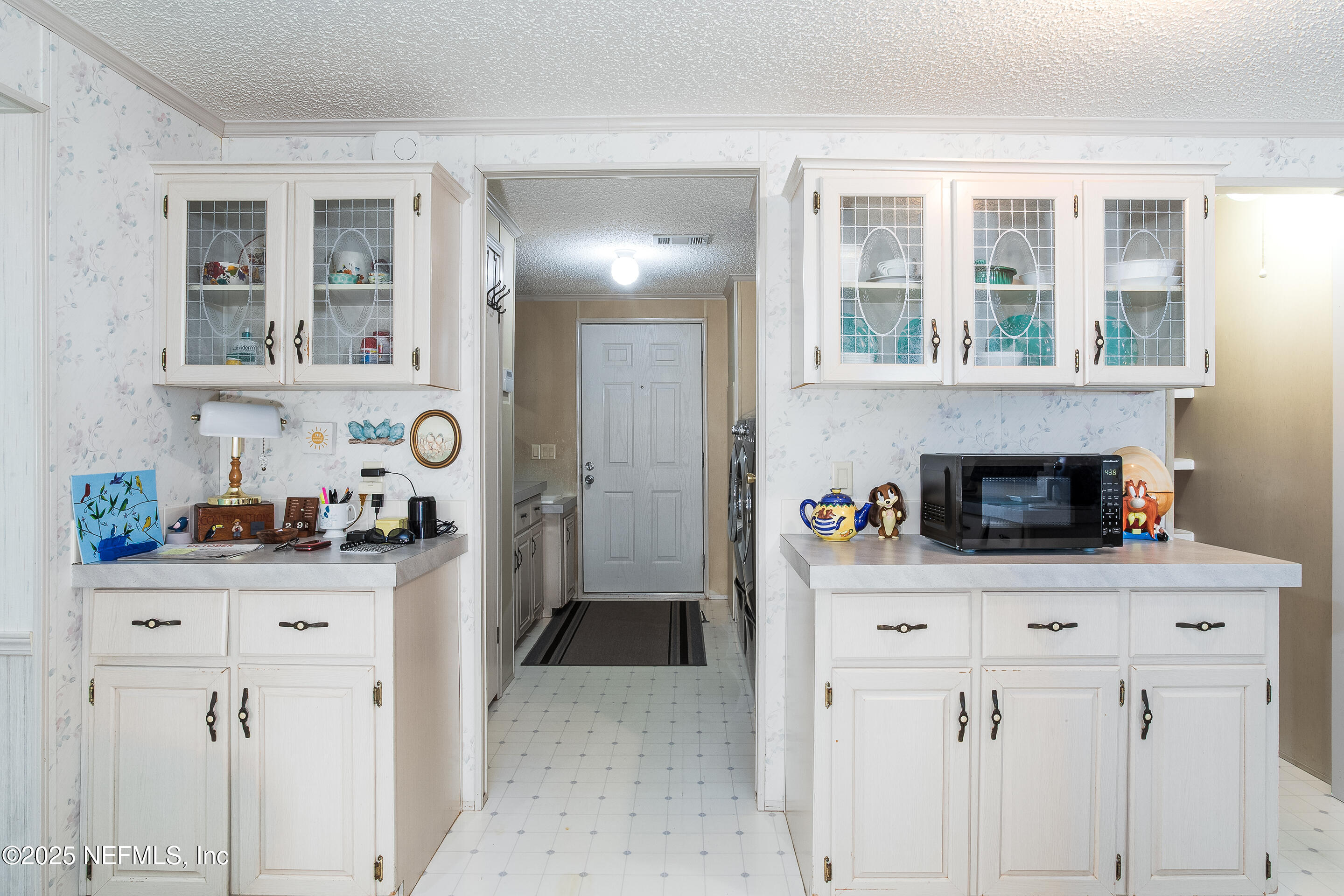 231 Knight Boxx Road Middleburg, FL 32068 - Photo 20 of 31 kitchen with going into laundry rm