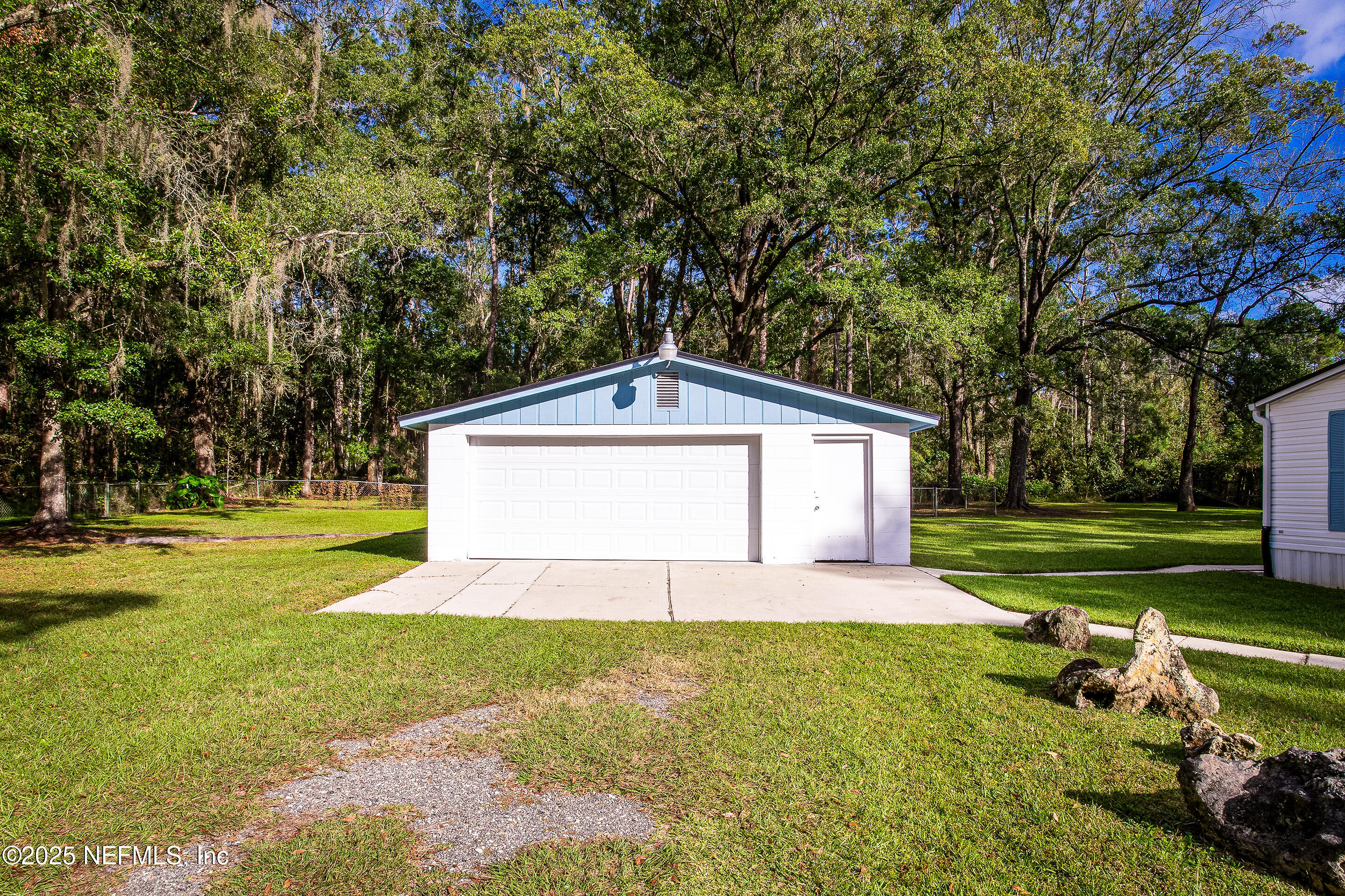 231 Knight Boxx Road Middleburg, FL 32068 - Photo 9 of 31 CBS 2 car garage