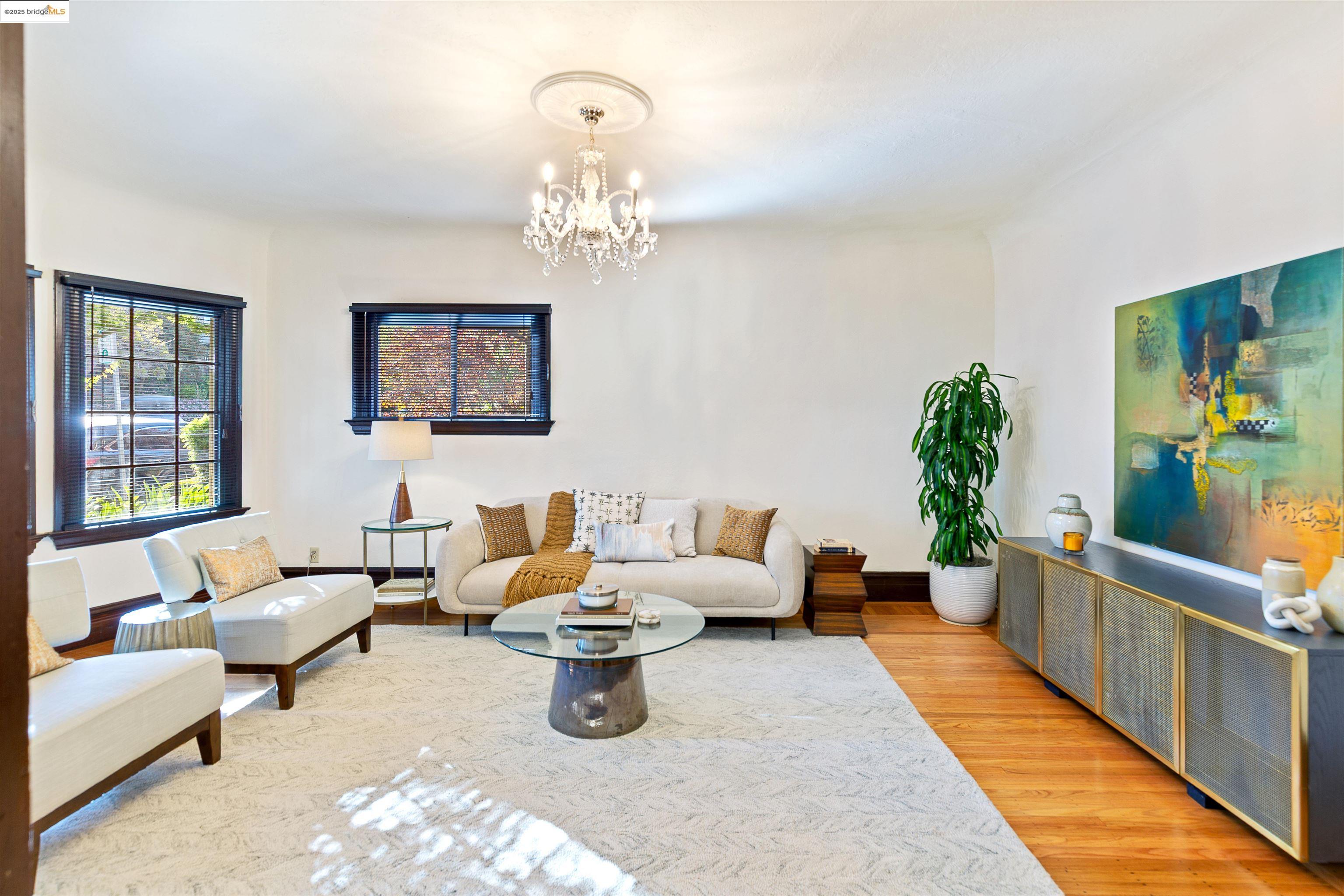 1512 Walnut Street Berkeley, CA 94709 - Photo 11 of 39 a living room with furniture and a chandelier