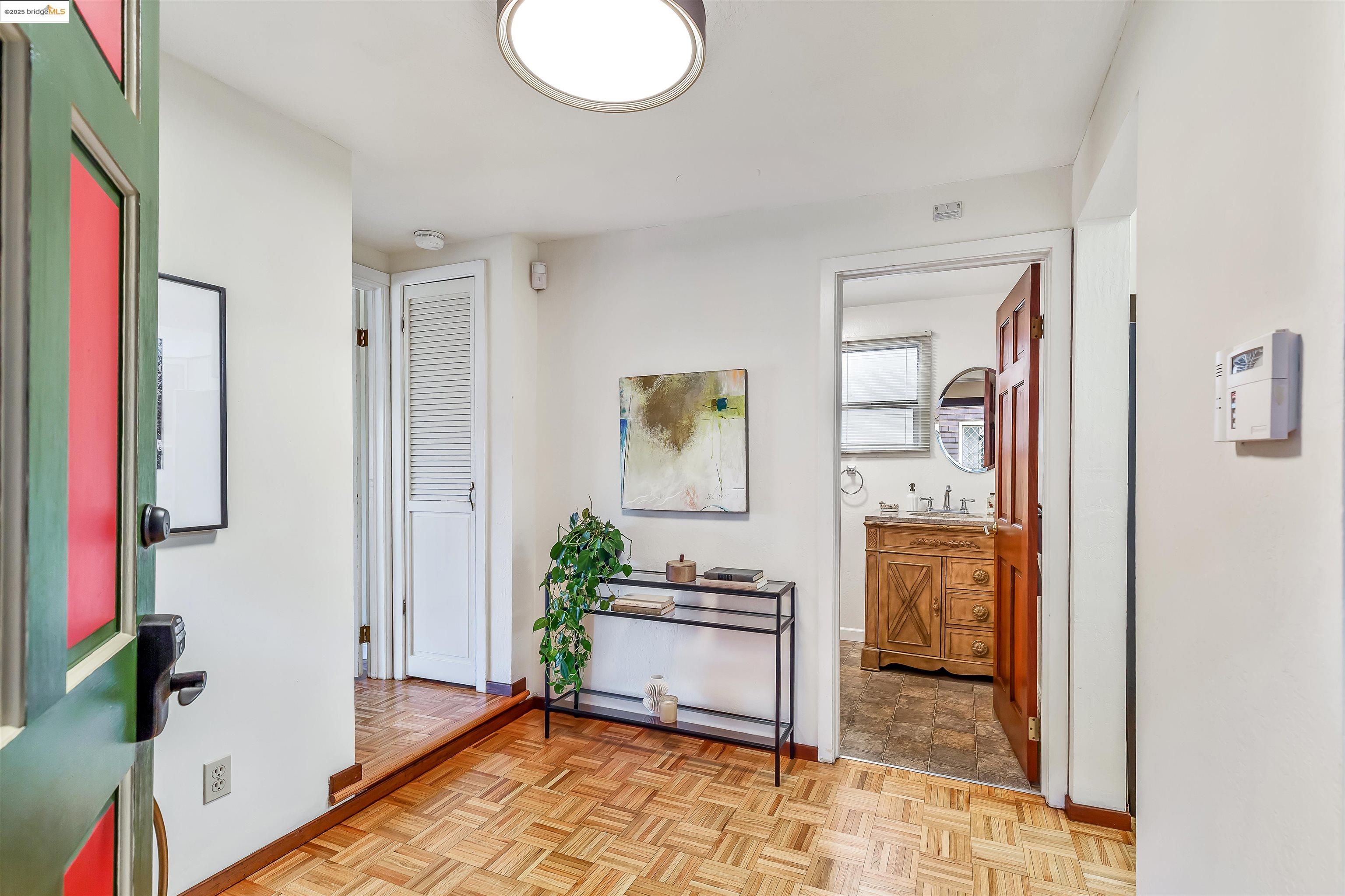 1512 Walnut Street Berkeley, CA 94709 - Photo 23 of 39 a living room with furniture and a potted plant