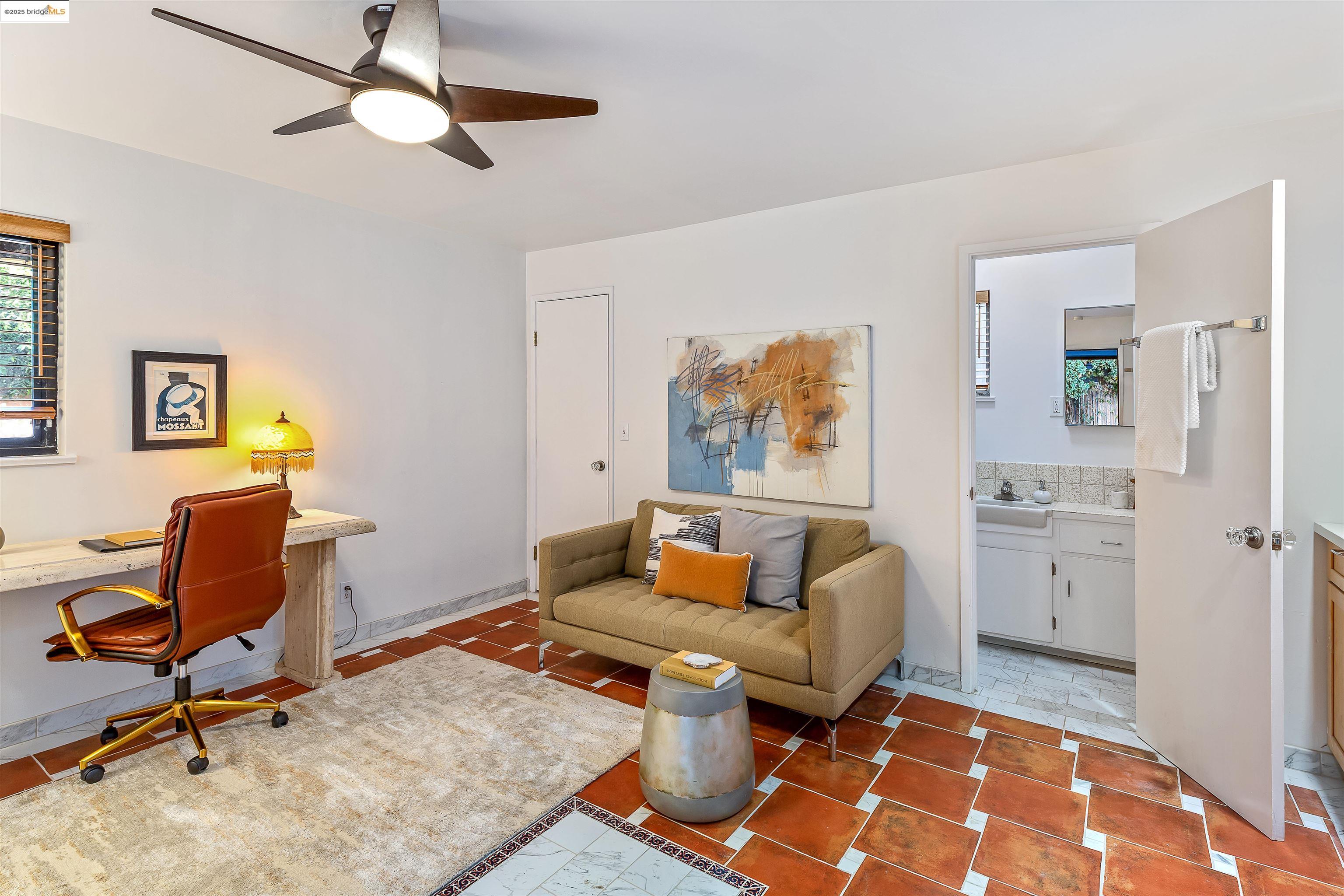 1512 Walnut Street Berkeley, CA 94709 - Photo 36 of 39 a living room with furniture and a rug