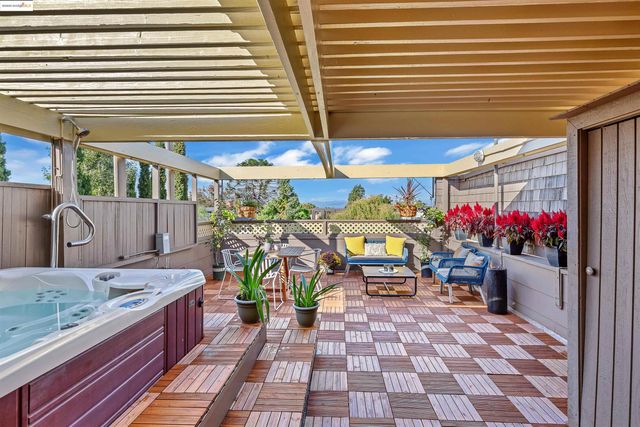 a view of a chairs and tables in patio
