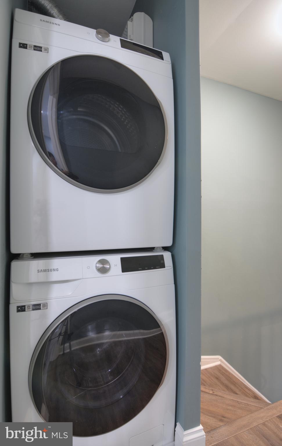 3822 Gawayne Terrace, Unit 32382 Silver Spring, MD 20906 - Photo 27 of 32 a utility room with dryer and washer