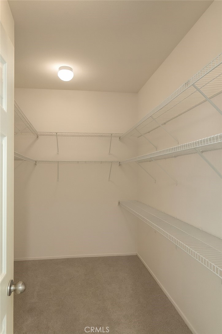 1457 Angelus Hill Road Hemet, CA 92545 - Photo 11 of 13 a view of a room with empty racks