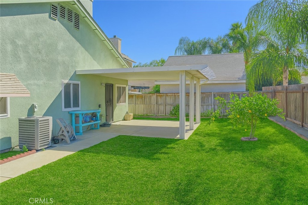 1457 Angelus Hill Road Hemet, CA 92545 - Photo 5 of 13 front view of a house with a yard