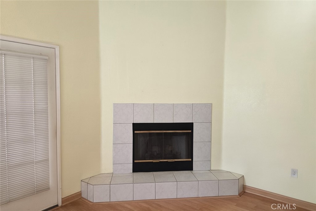 1457 Angelus Hill Road Hemet, CA 92545 - Photo 6 of 13 a living room with a fireplace