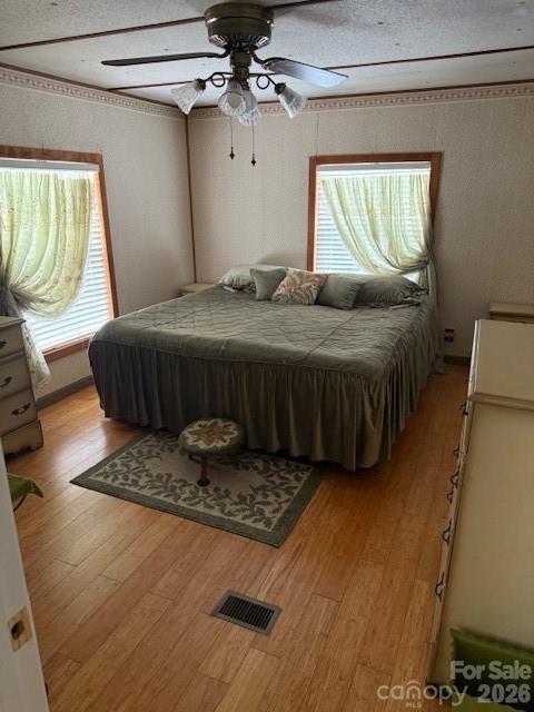 2056 Sipe Road Conover, NC 28613 - Photo 3 of 7 a bedroom with a bed dresser and a window